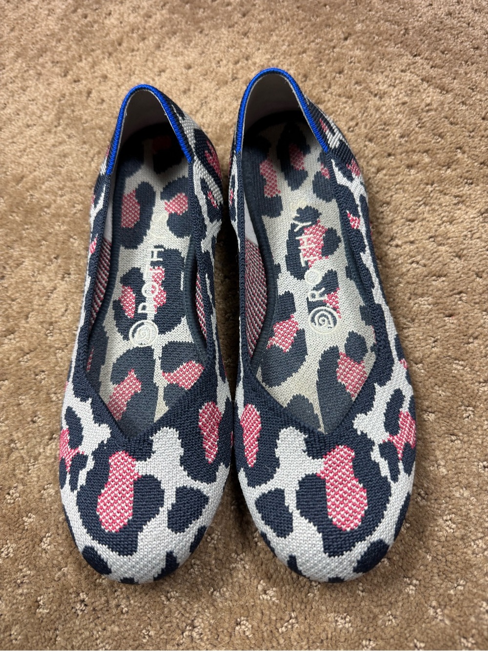 Rothy's shoes in the Red Cat leopard print pattern.